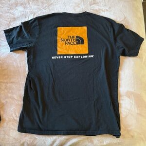 The North Face T-Shirt Mens Large Black Orange Crew Neck Never Stop Exploring